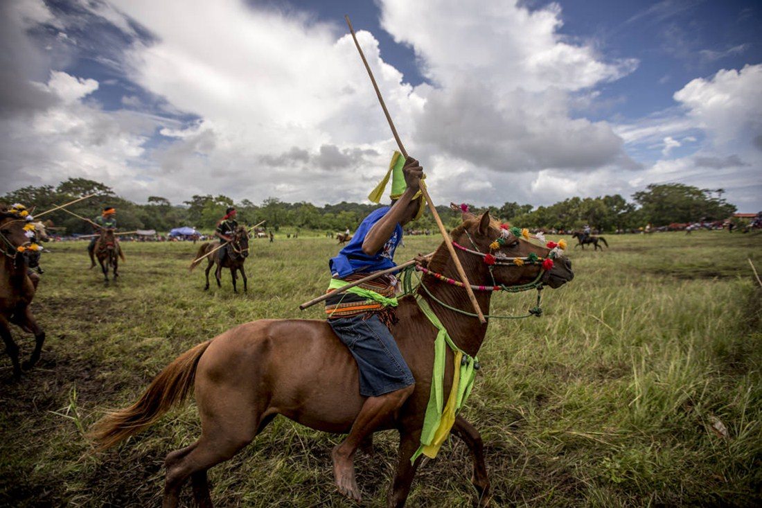 The Pasola underway in Gaura, West Sumba